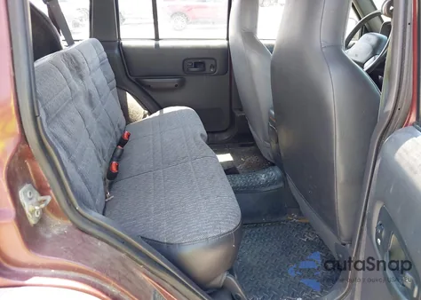 2000 Jeep Cherokee Sport z USA, uszkodzony, nr VIN 1J4FF48S7YL129654